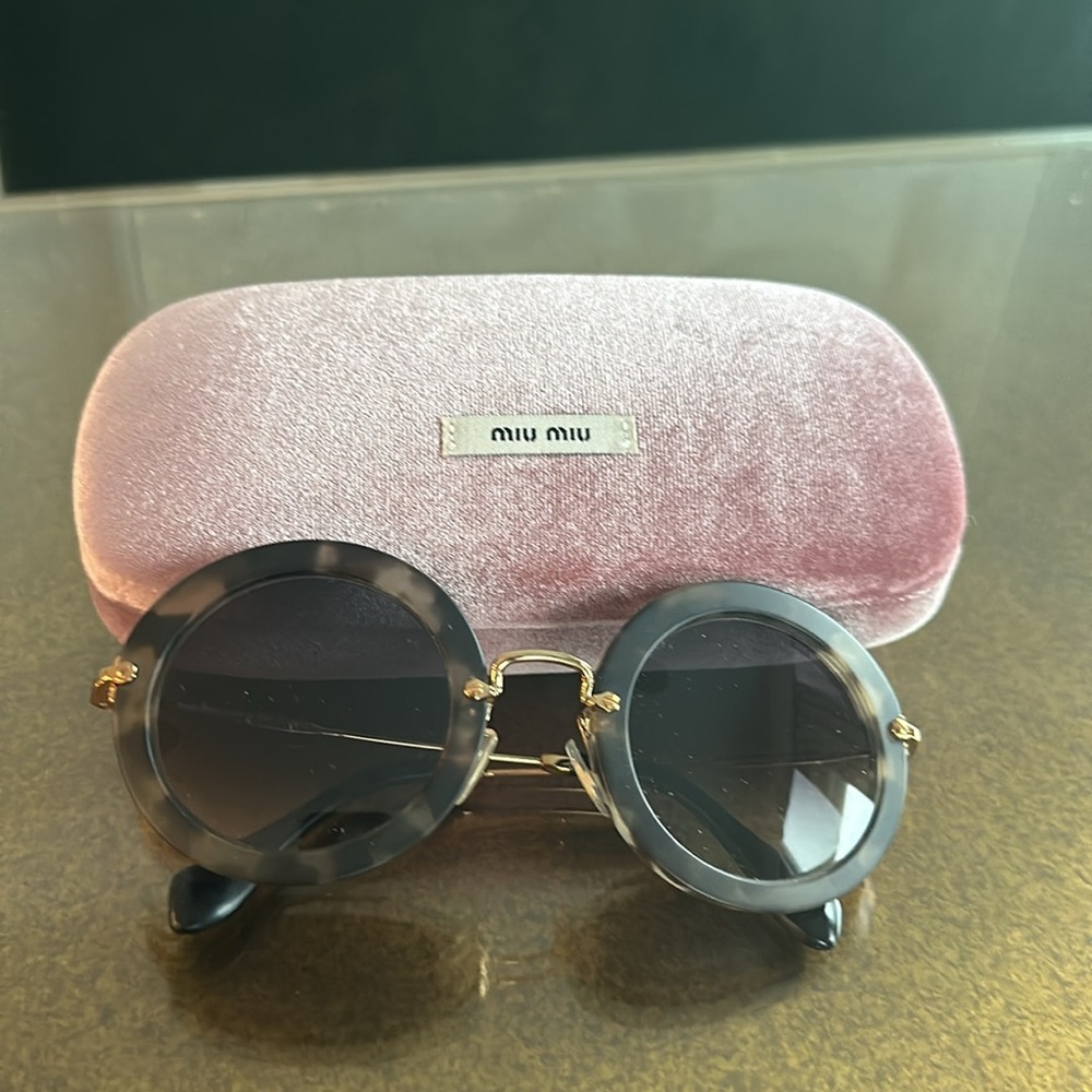 Miu Miu Delice round tortoise shell color brown sunglasses